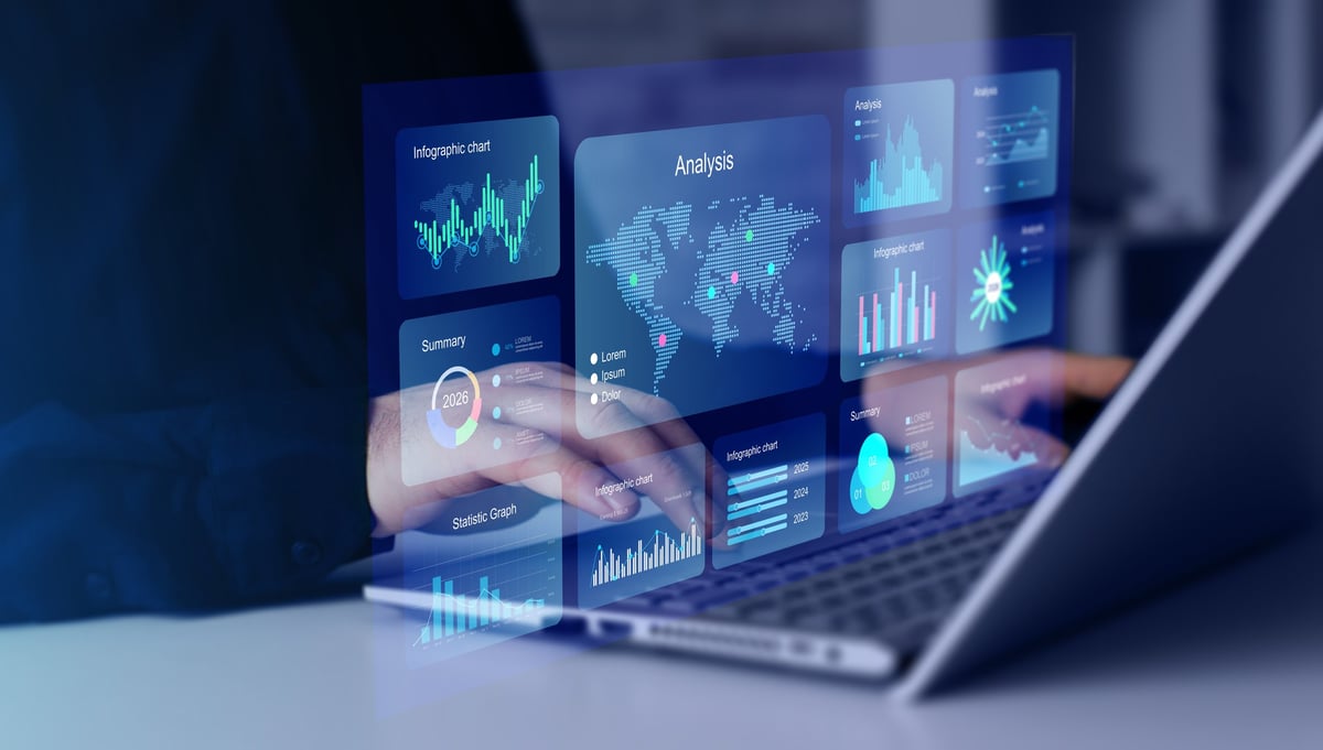 Businessman analyzing digital financial dashboard with market data